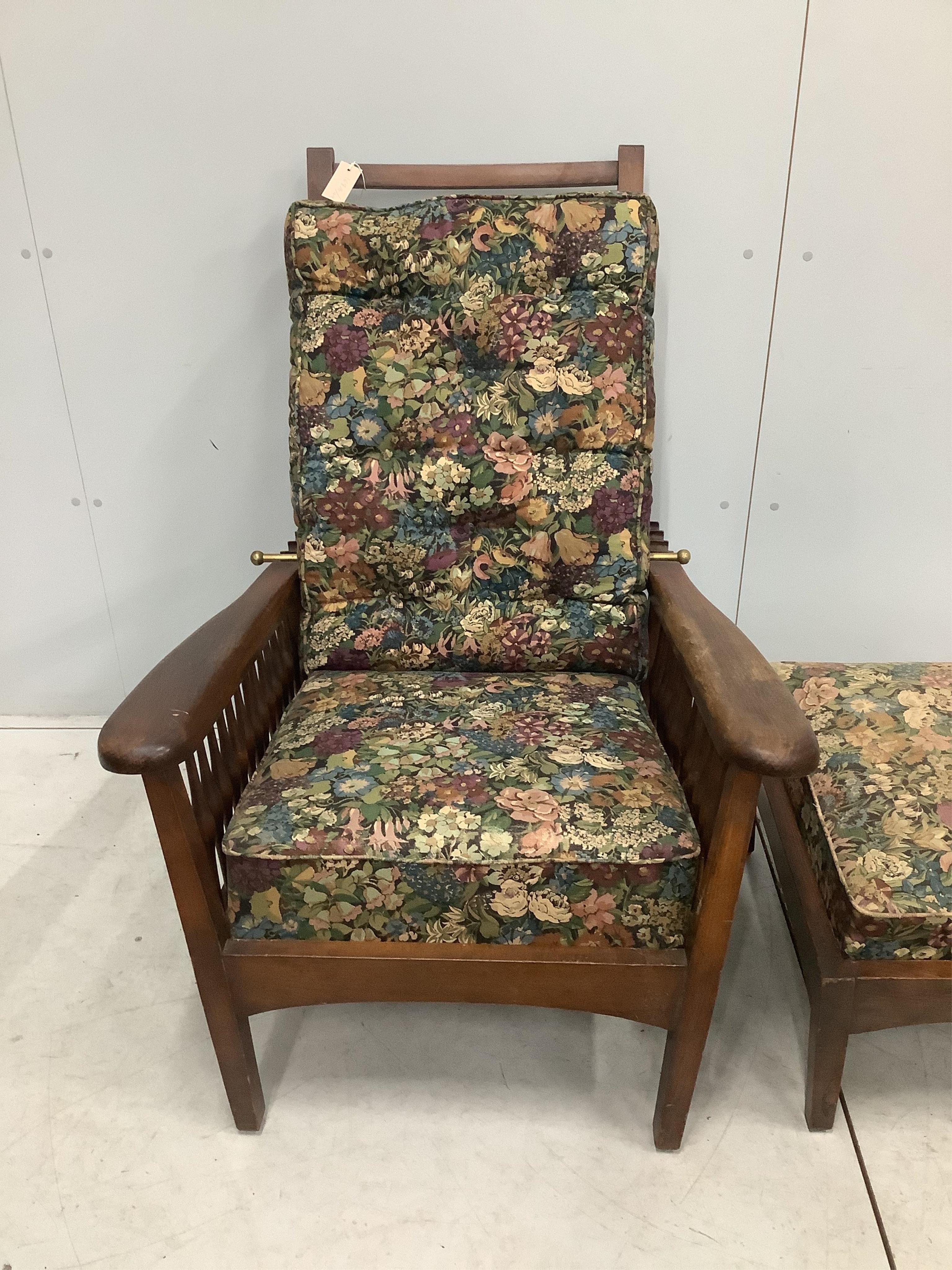 An early 20th century Morris style beech reclining armchair with a matching footstool, width 78cm, depth 92cm, height 108cm. Condition - fair